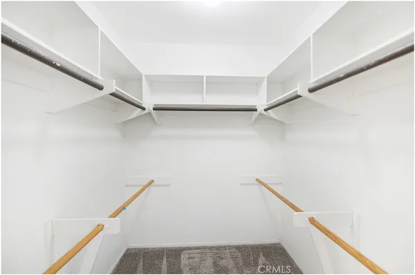 a view of a hallway with staircase