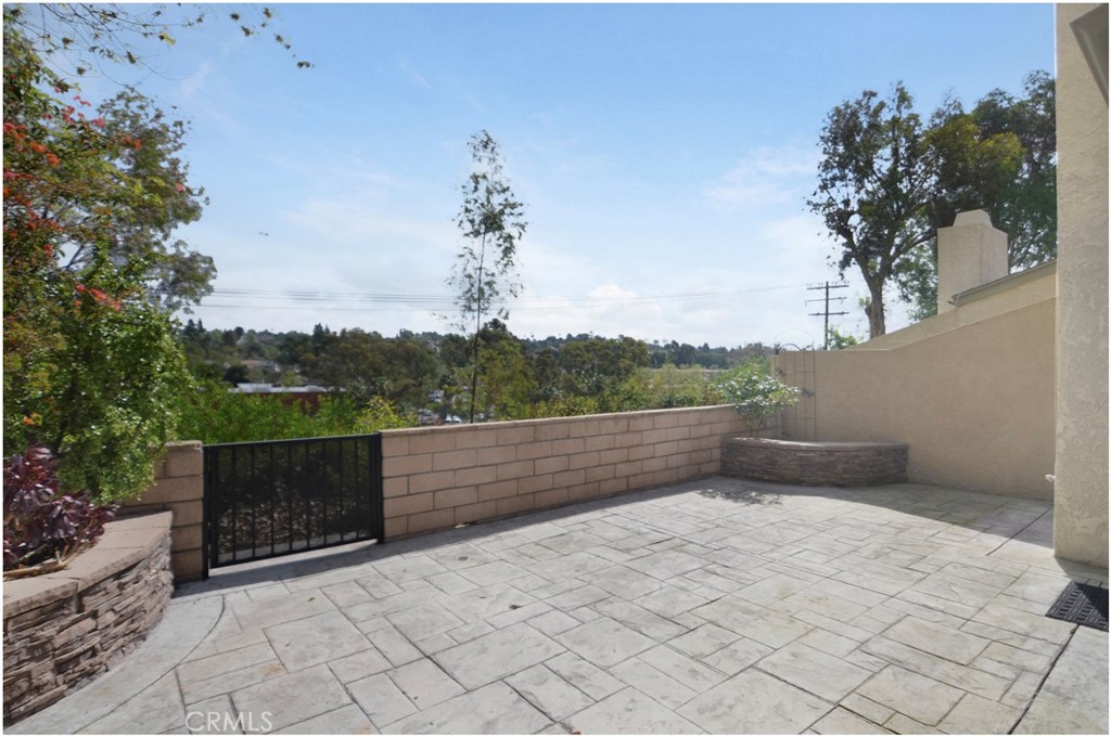 24802 Leto Circle Mission Viejo, CA 92691 - Photo 19 of 27 a view of a terrace with a bench
