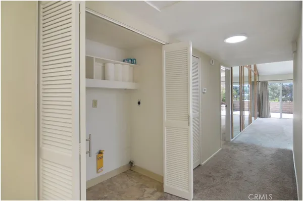 a view of a swimming pool with lounge chair