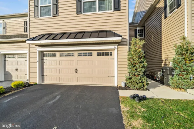 a view of a house with a garage