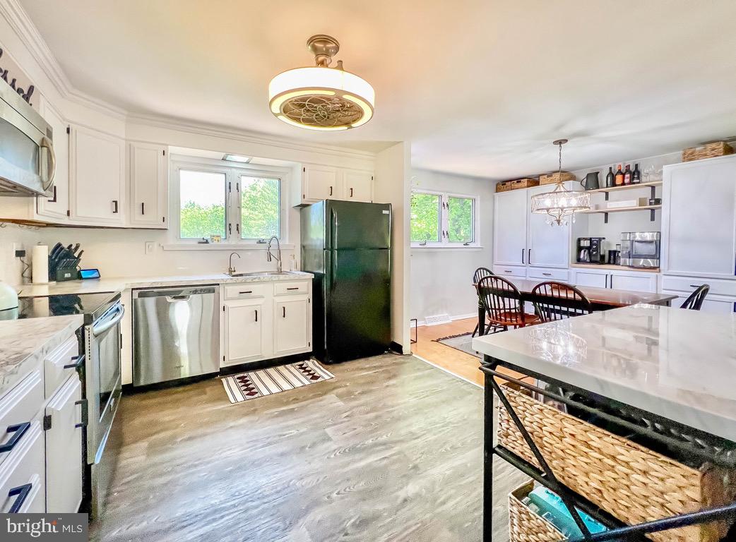 107 Pawnee Road Doylestown, PA 18901 - Photo 8 of 34 Light is also a ceiling fan
