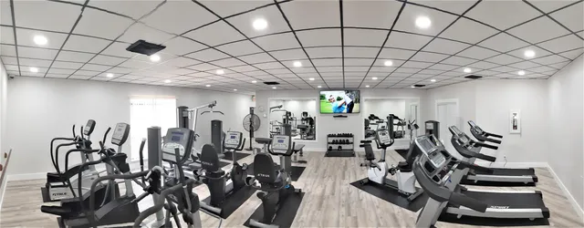a view of a room with gym equipment