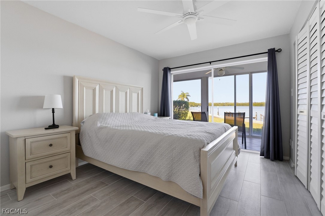 4440 Exeter Drive Longboat Key, FL 34228 - Photo 14 of 24 a bed sitting in a bedroom next to a window