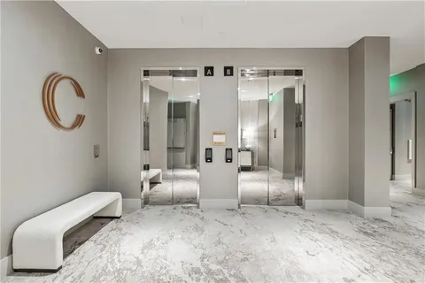 a view of a living room and dining room