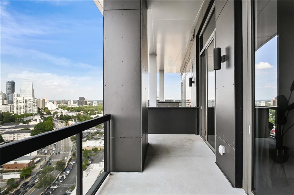 3107 Peachtree Road Northeast, Unit 2003 Atlanta, GA 30305 - Photo 43 of 114 a view of a glass door and balcony