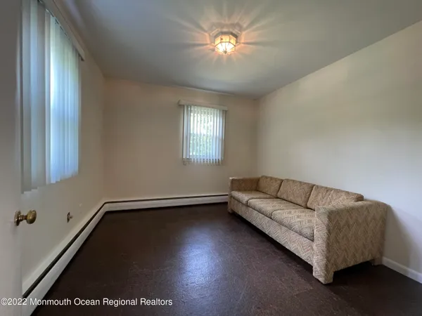 a kitchen with a sink and wooden cabinets