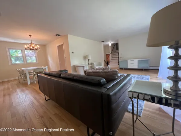 a view of a hallway with toilet