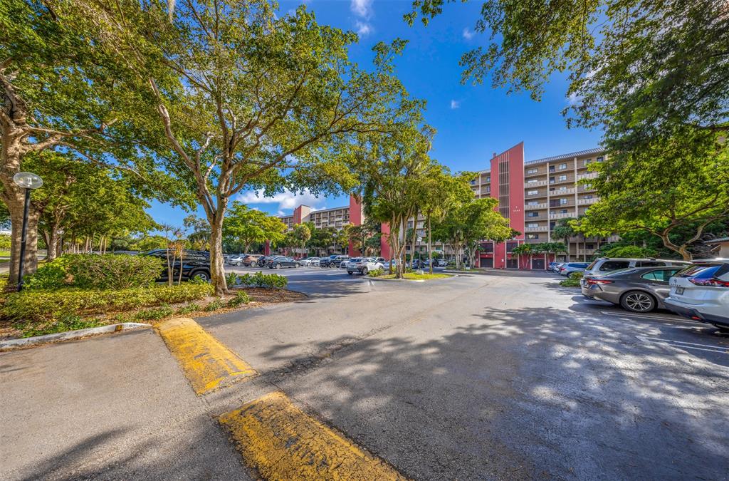 2202 South Cypress Bend Drive, Unit 207 Pompano Beach, FL 33069 - Photo 20 of 20 a view of street with cars