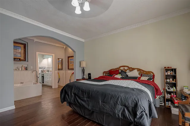 a bathroom with a bathtub and a sink