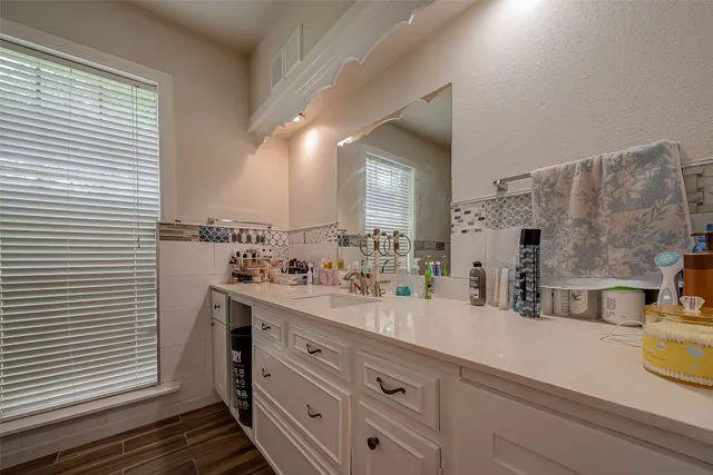 a view of a livingroom with furniture and a chandelier