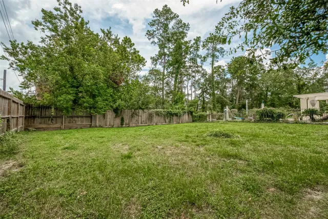 a view of a backyard with a garden