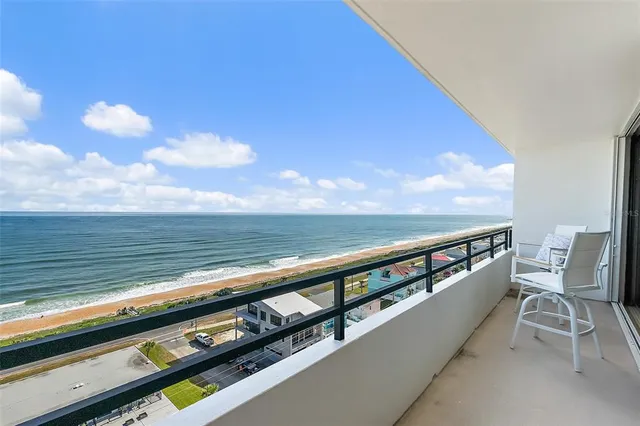 a view of swimming pool with seating space