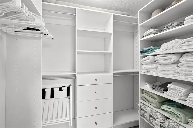a bathroom with a toilet a sink and a mirror