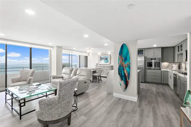 a living room with furniture and a table