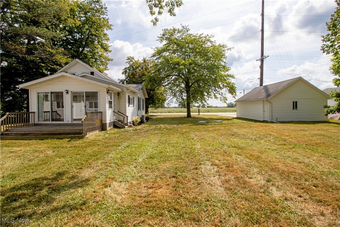 8984 Spencer Road Homerville, OH 44235 - Photo 3 of 27 View of yard with a deck
