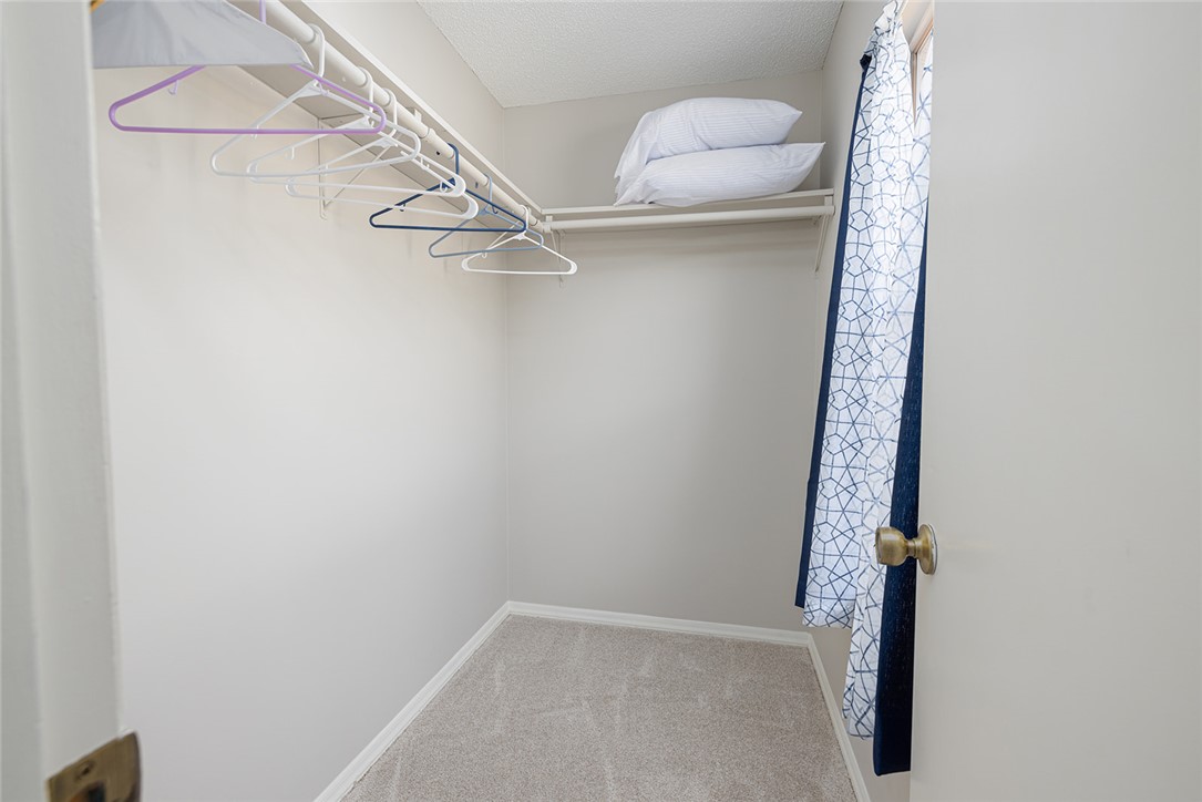 410 South Cove Road Seneca, SC 29672 - Photo 20 of 25 This spacious closet offers ample storage and organization solutions.