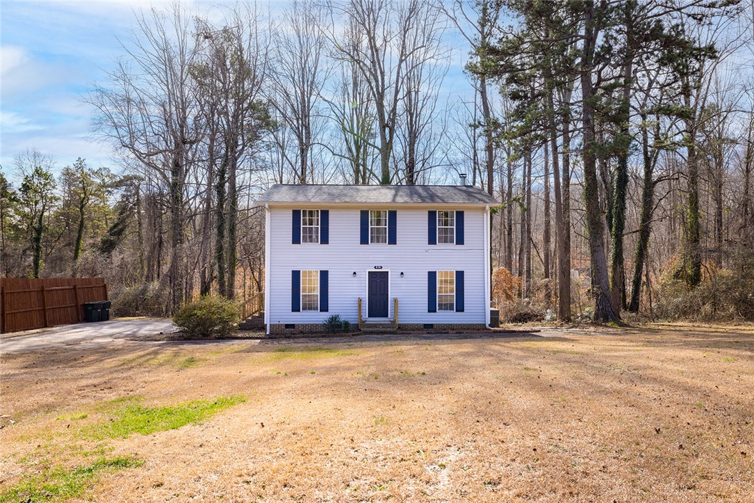 410 South Cove Road Seneca, SC 29672 - Photo 2 of 25 This charming home offers a serene escape, surrounded by nature and mature trees.