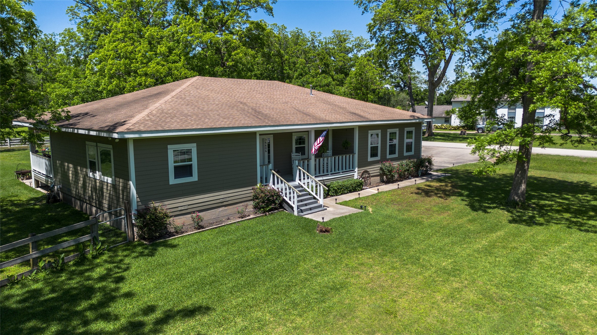 36606 Tejas Road Simonton, TX 77485 - Photo 13 of 35 a view of a house with backyard porch and garden