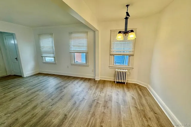 a view of livingroom with hardwood floor and window