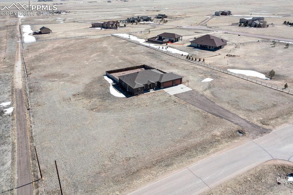 10935 McKissick Road Peyton, CO 80831 - Photo 12 of 50 a white bath tub sitting in a bathroom