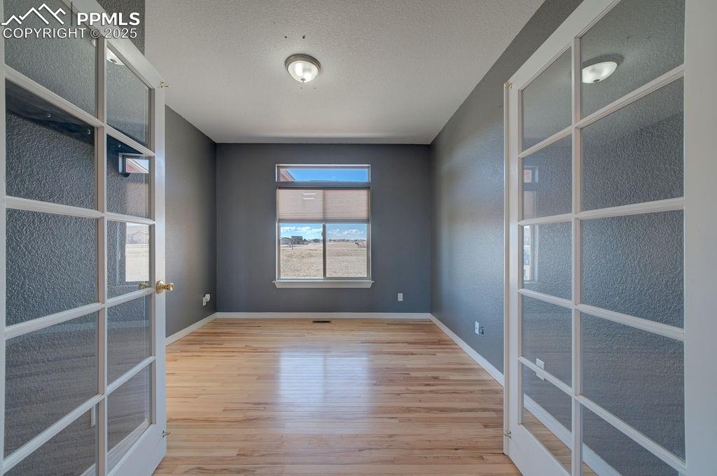 10935 McKissick Road Peyton, CO 80831 - Photo 25 of 50 a view of an empty room with a window