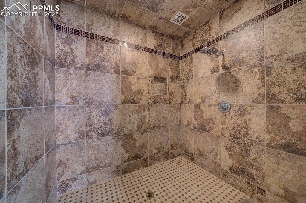 10935 McKissick Road Peyton, CO 80831 - Photo 41 of 50 a bathroom with a shower