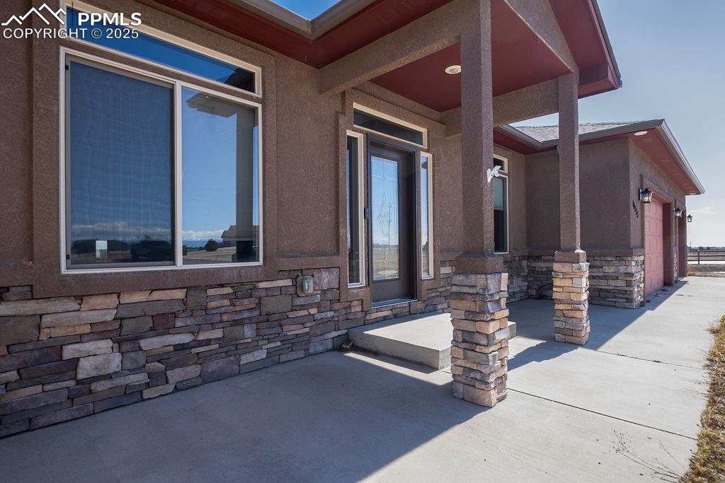 10935 McKissick Road Peyton, CO 80831 - Photo 5 of 50 a lobby with furniture and window