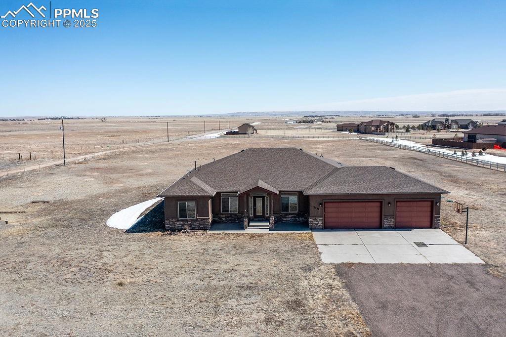 10935 McKissick Road Peyton, CO 80831 - Photo 6 of 50 an aerial view of a house with a terrace