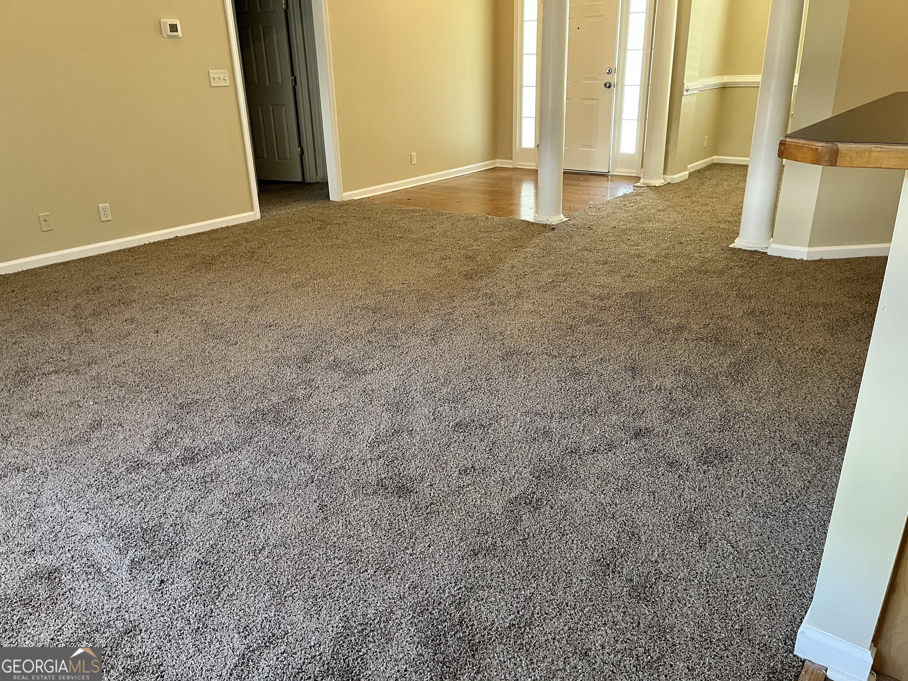 99 High Point North Newnan, GA 30265 - Photo 12 of 33 an empty room with a fireplace