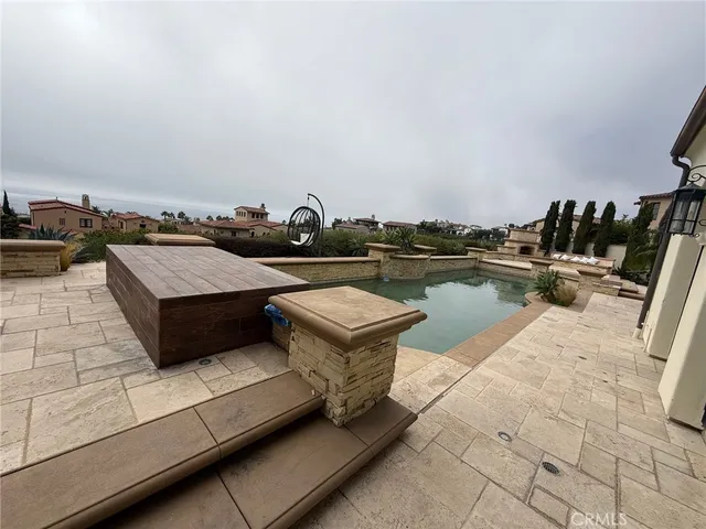 a terrace with sitting area and city view