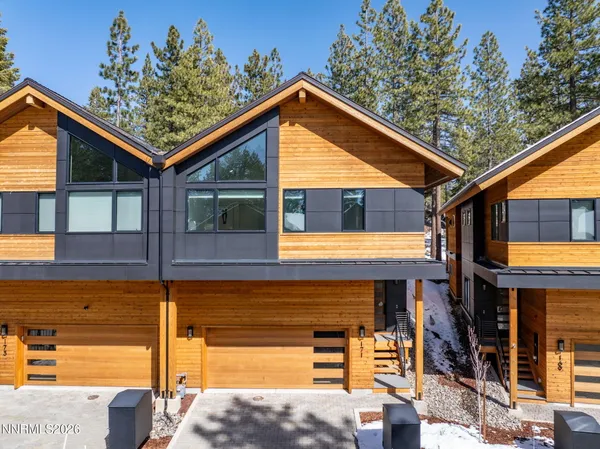 a house with trees in the background