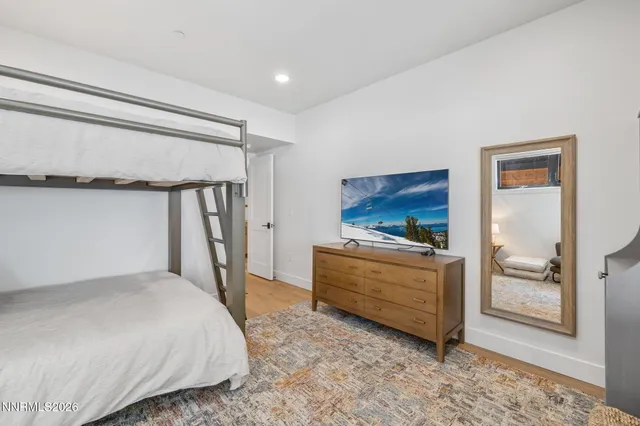 a room with a bed and a view of en suite bathroom