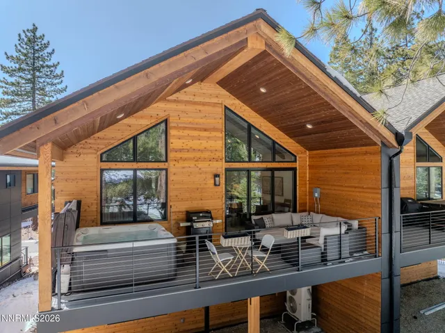 a view of house with a outdoor seating