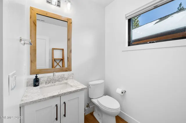 a utility room with cabinets dryer and washer