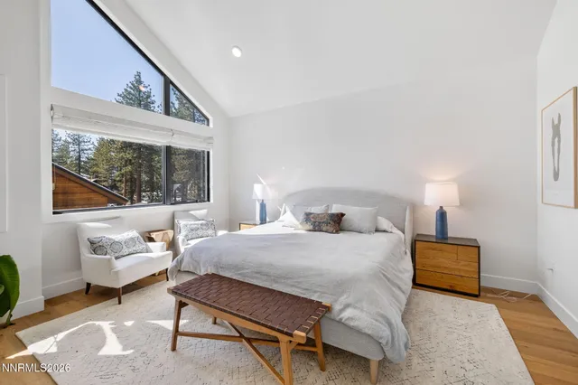 a bathroom with a sink a mirror and a shower