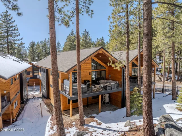a backyard of a house with seating space
