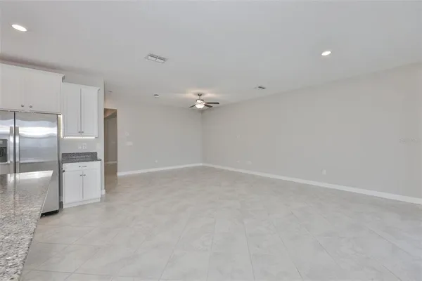 a large kitchen with cabinets