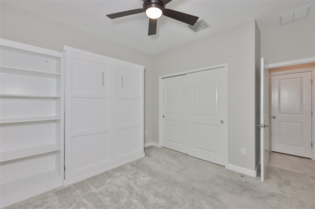 11454 Freshwater Ridge Drive Riverview, FL 33569 - Photo 20 of 65 a view of an empty room