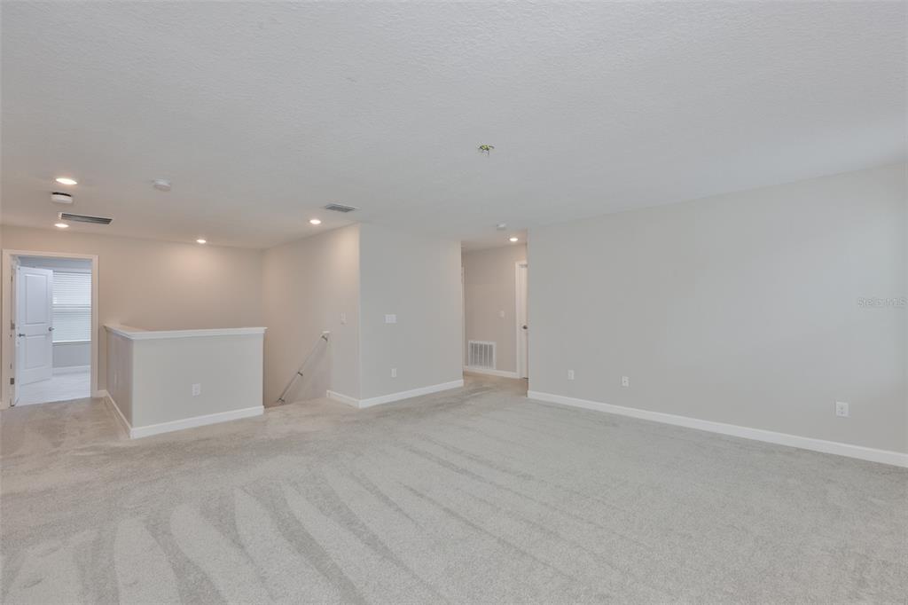 11454 Freshwater Ridge Drive Riverview, FL 33569 - Photo 27 of 65 a view of an empty room