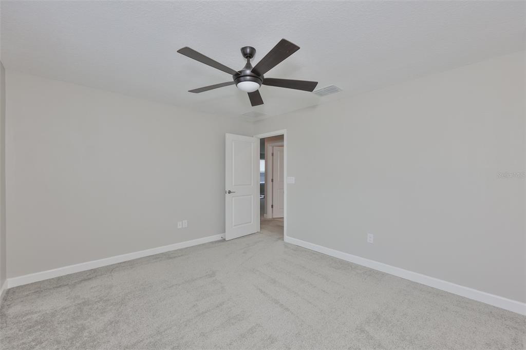 11454 Freshwater Ridge Drive Riverview, FL 33569 - Photo 41 of 65 a view of an empty room