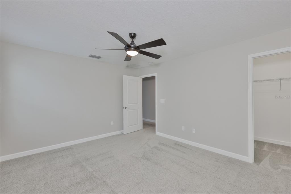 11454 Freshwater Ridge Drive Riverview, FL 33569 - Photo 45 of 65 a view of an empty room