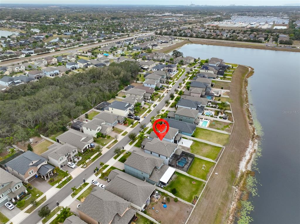 11454 Freshwater Ridge Drive Riverview, FL 33569 - Photo 58 of 65 an aerial view of residential building and lake