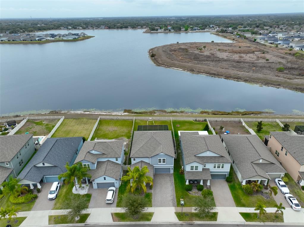 11454 Freshwater Ridge Drive Riverview, FL 33569 - Photo 61 of 65 an aerial view of a house with a lake view