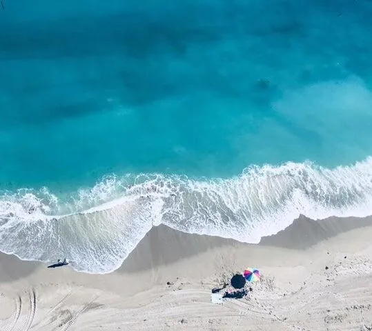 a view of a livingroom with furniture and front door