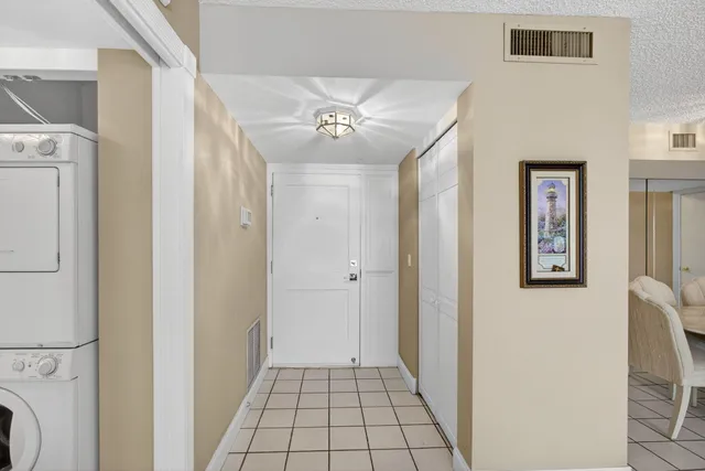 a view of a balcony with floor to ceiling window with wooden floor