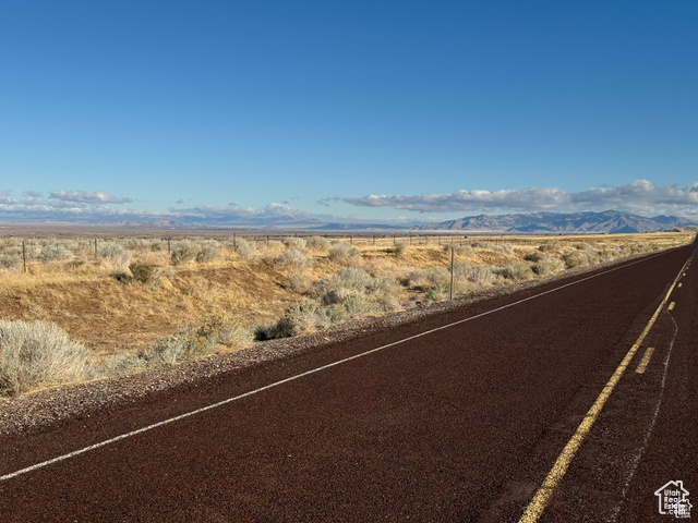 1000 South Foothill Boulevard Delta, UT 84624 - Photo 26 of 33 View of asphalt street featuring a mountain view and a view of countryside