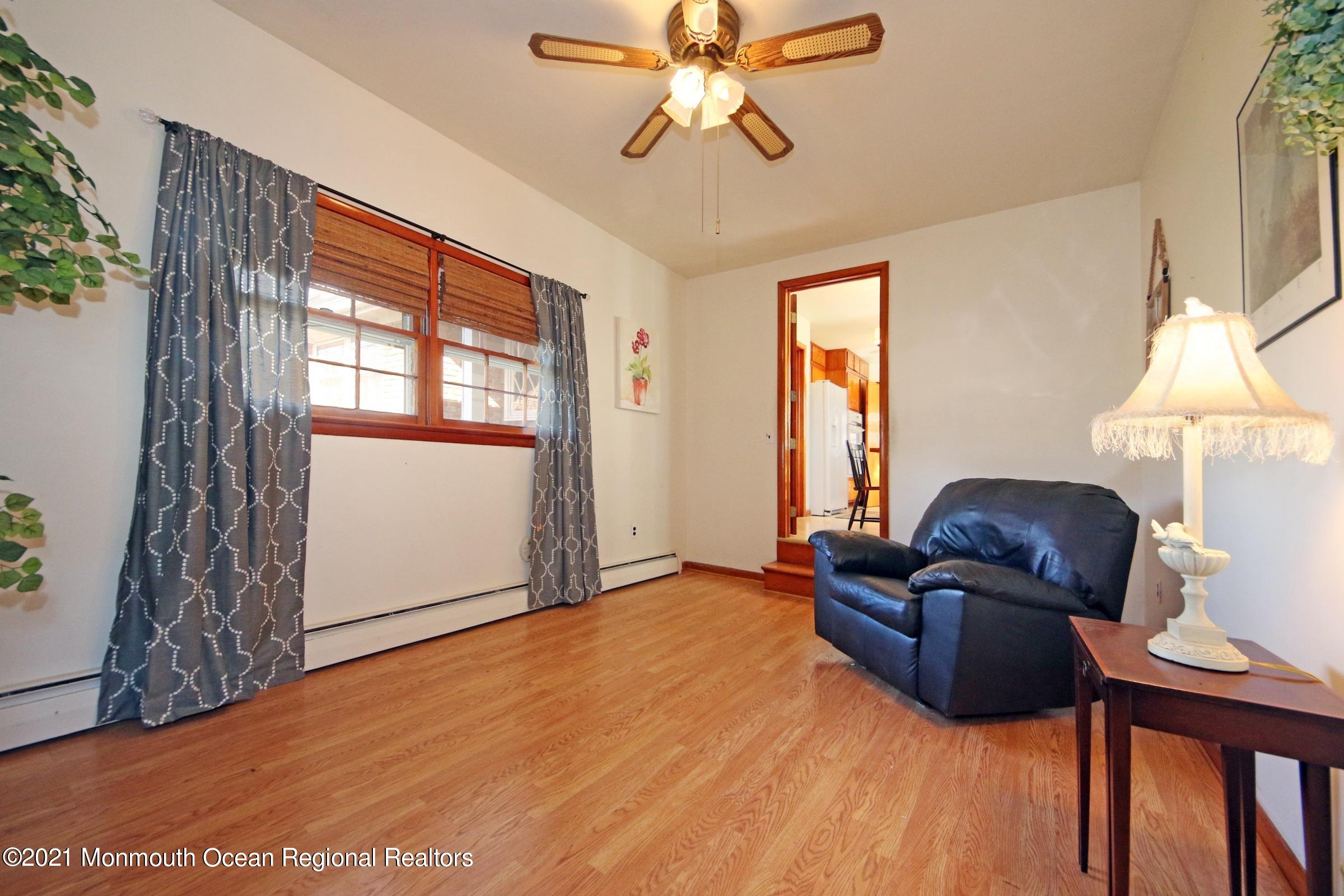 700 Hopping Road Belford, NJ 07718 - Photo 20 of 35 a living room with furniture and a window