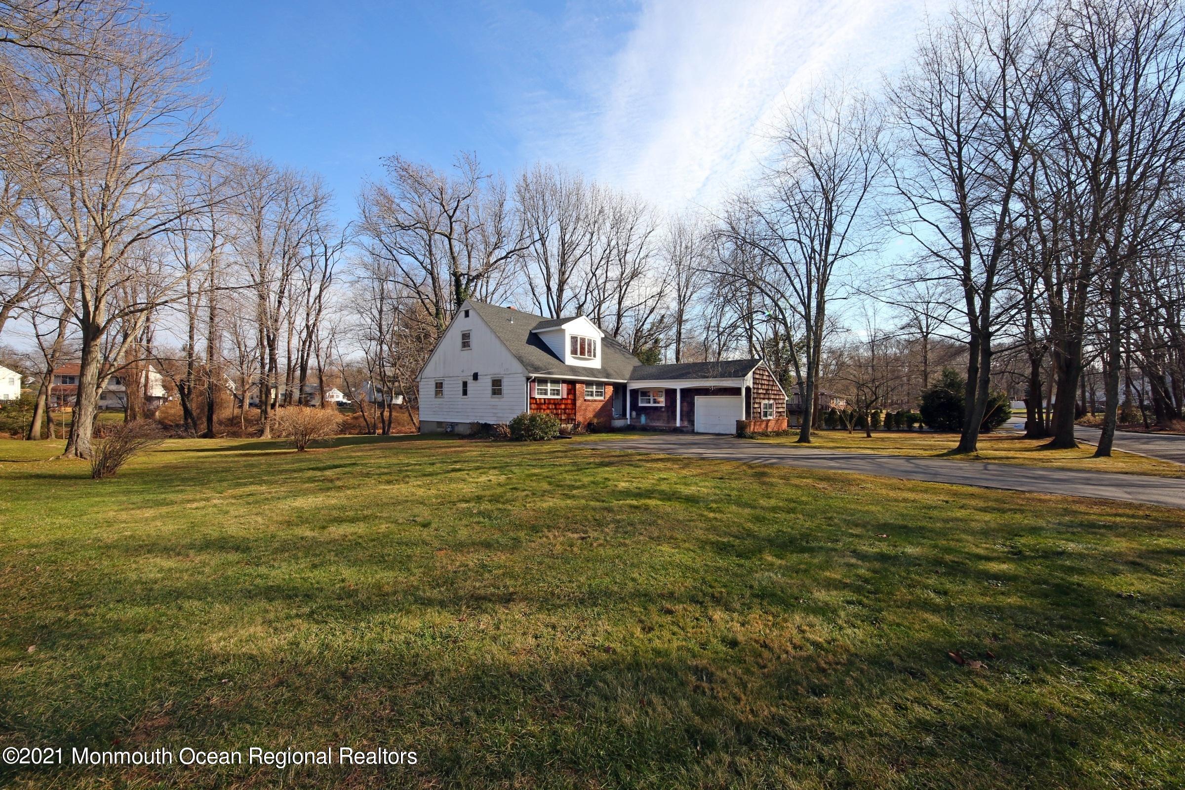 700 Hopping Road Belford, NJ 07718 - Photo 3 of 35 a view of a lake with houses