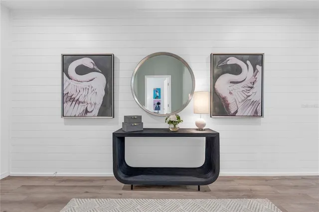 a view of staircase with wooden floor