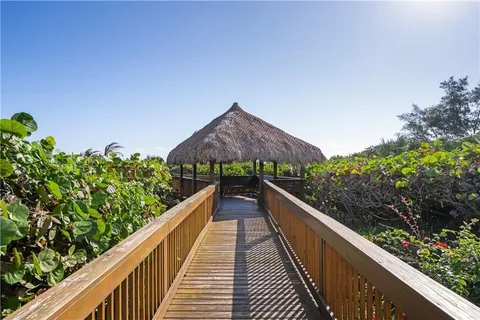 a view of balcony and yard